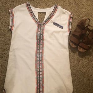 White Cotton dress with embroidered design.